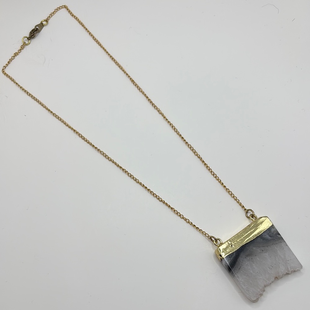 Elegant Gold and Silver Pendant Necklace